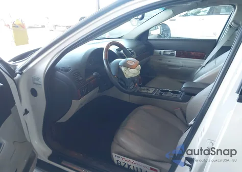 2003 Lincoln Ls V8 z USA, uszkodzony, nr VIN 1LNHM87A03Y698129